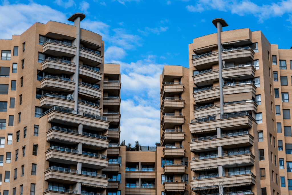 brown buildings against blue sky