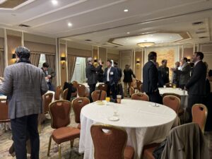 several people wearing formals in a room