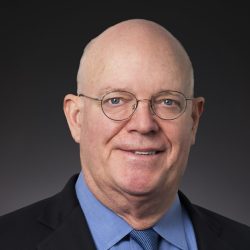 a commercial real estate professional, Mark Melhuish